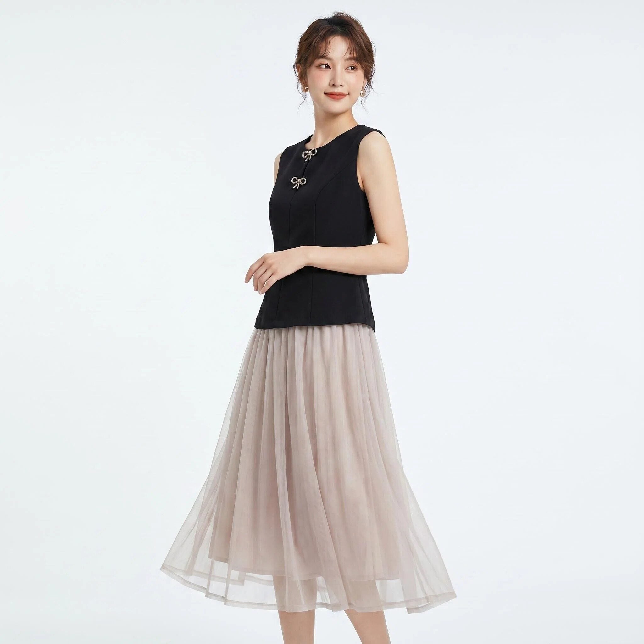 Set 2 món áo hai dây nơ + chân váy B285